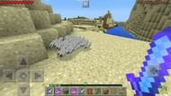 A large number feathers dropping from the looting enchantment (Image via Mojang)